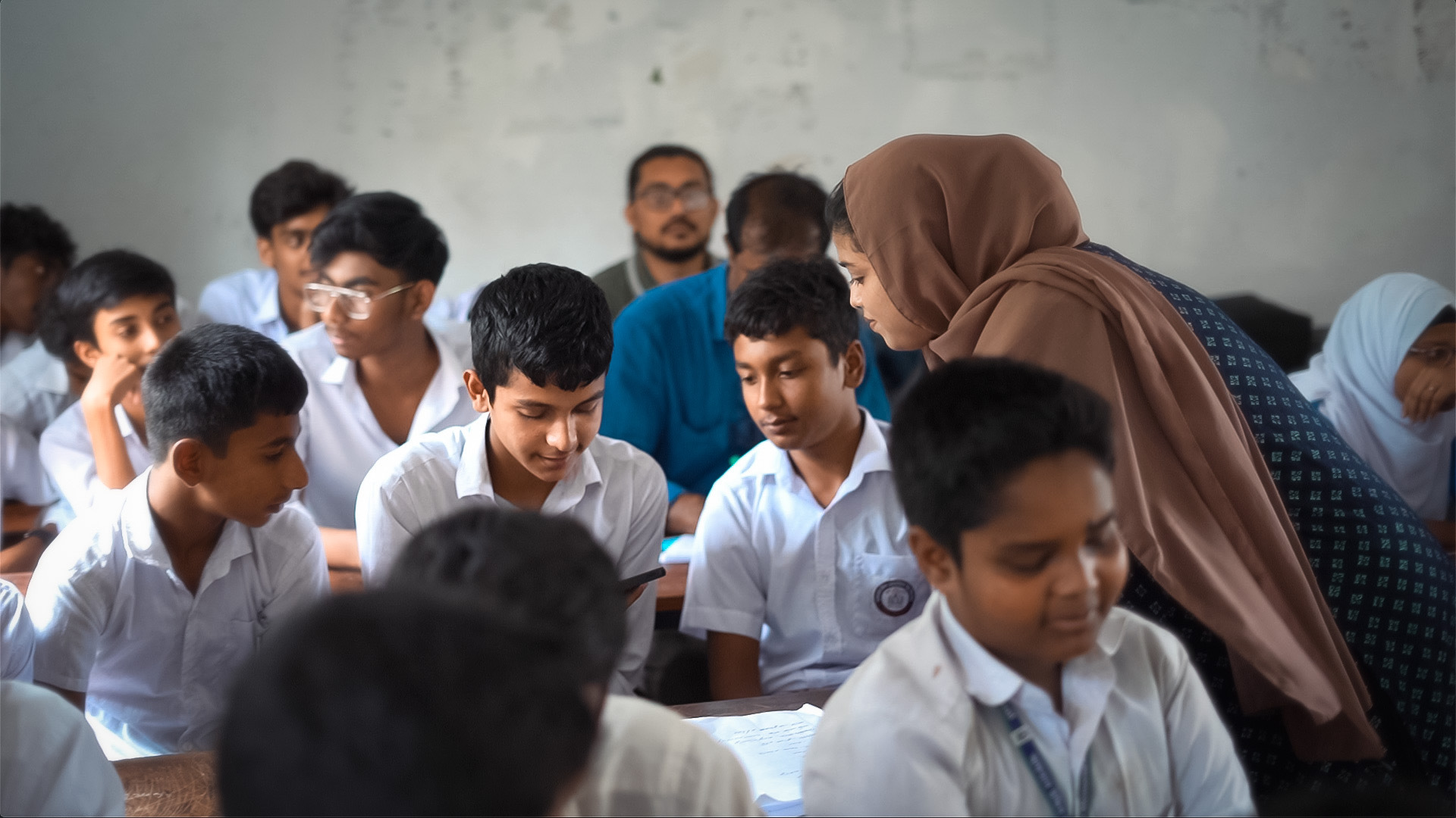 Students practicing AI activities in a classroom session